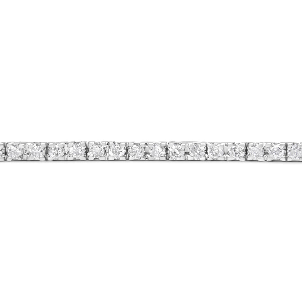 Bracciale tennis classico in oro bianco 10 carati con diamanti taglio rotondo da 7,25" incastonati a griffe da 2,0 ct (colore GH, purezza I1-I2) - Friggin Jewelry