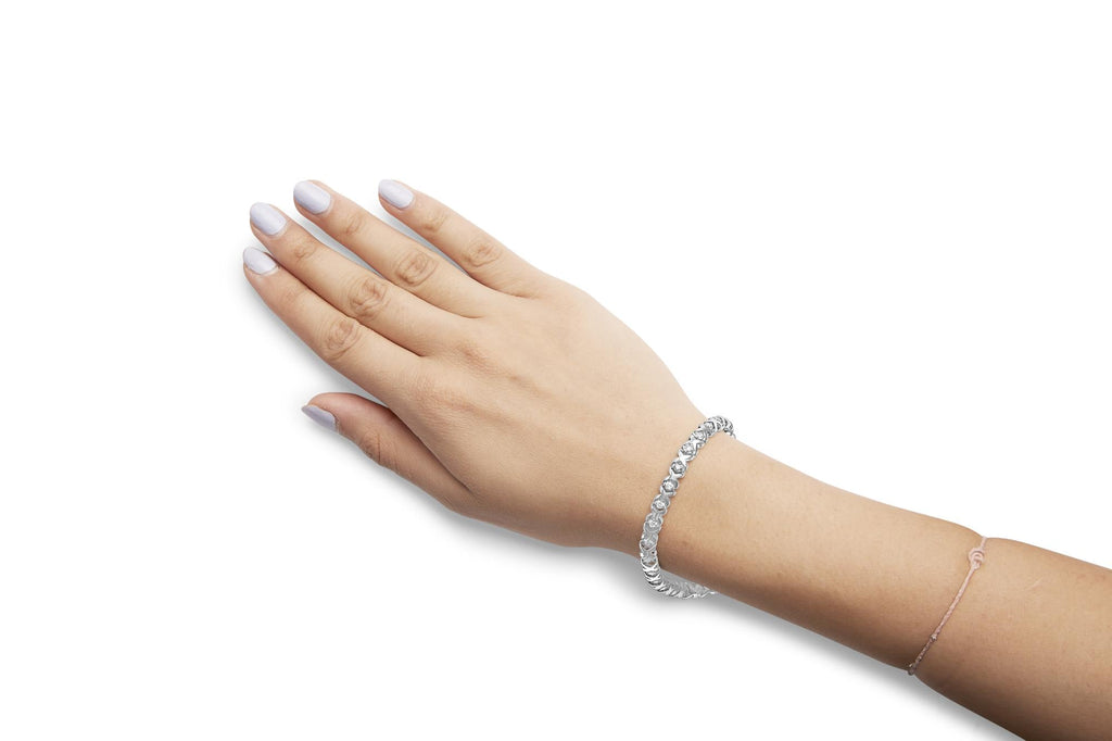 Pulsera de tenis de oro blanco de 10 quilates con diamantes de 1 1/2 quilates y eslabones X de 7,5" (color HI, claridad I2-I3) - Friggin Jewelry