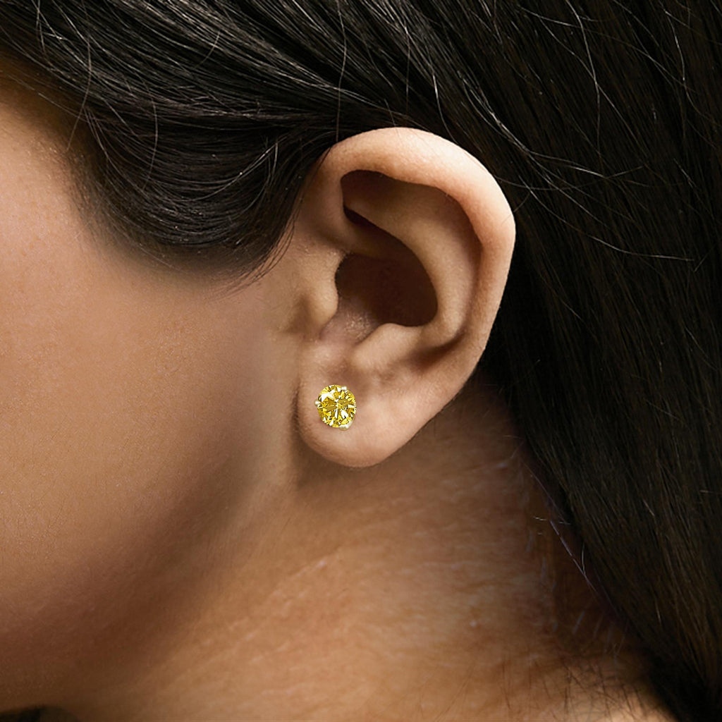 Orecchini a bottone con diamante solitario giallo incastonato in laboratorio a 3 punte in oro 14 carati - Friggin Jewelry