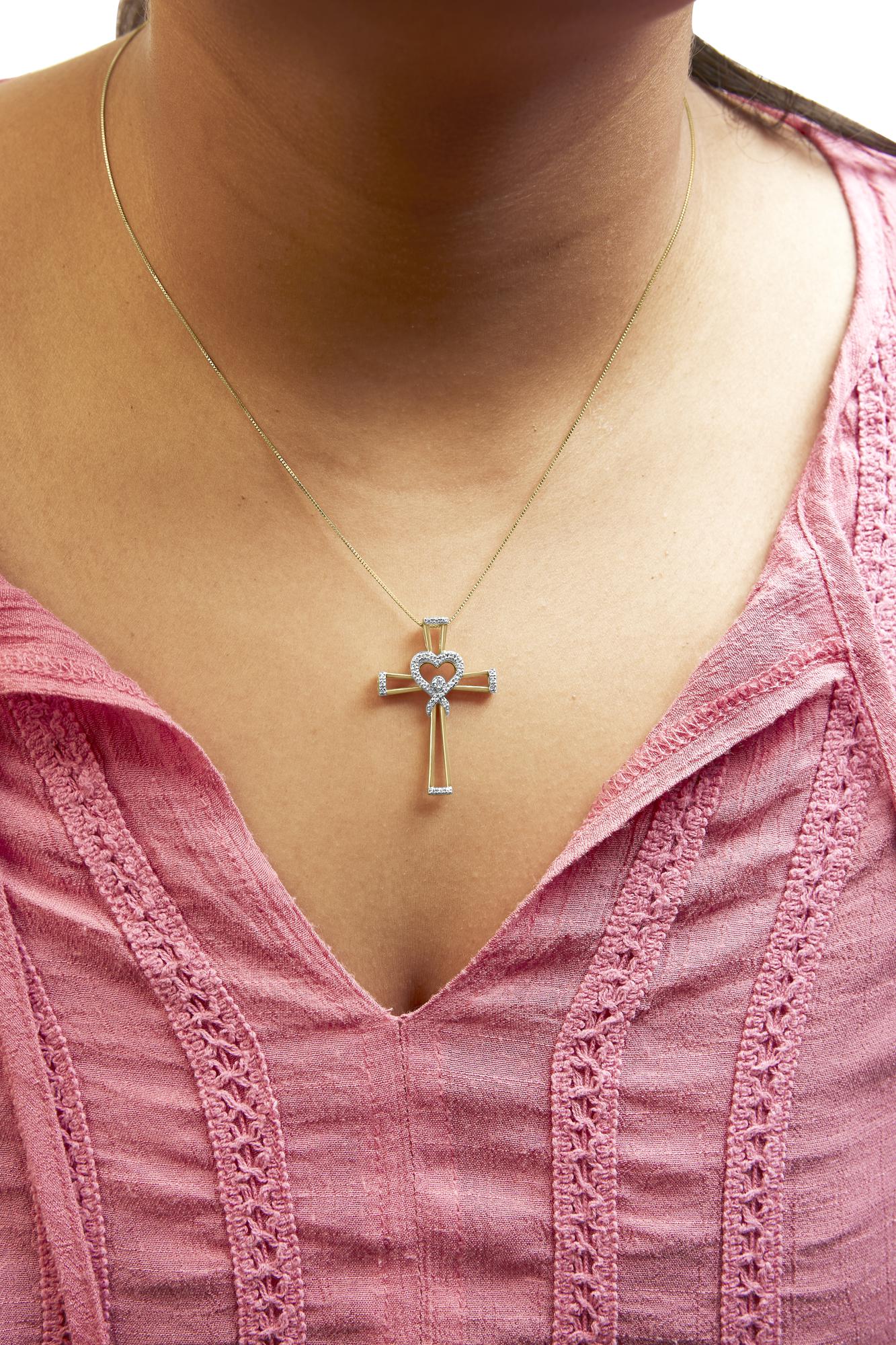 14K Yellow Gold Plated .925 Sterling Silver 1/6 Cttw Diamond Interlocking Heart and Ribbon Cross Pendant Necklace (H-I Color, I2-I3 Clarity) - 18" Inches - Friggin Jewelry