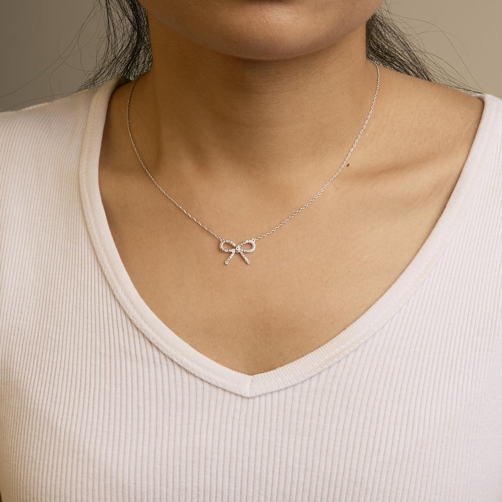 .925 Sterling Silver Diamond Accent Ribbon Bow Knot Pendant Necklace (J-K Color, I2-I3 Clarity) - 18" Inches - Friggin Jewelry
