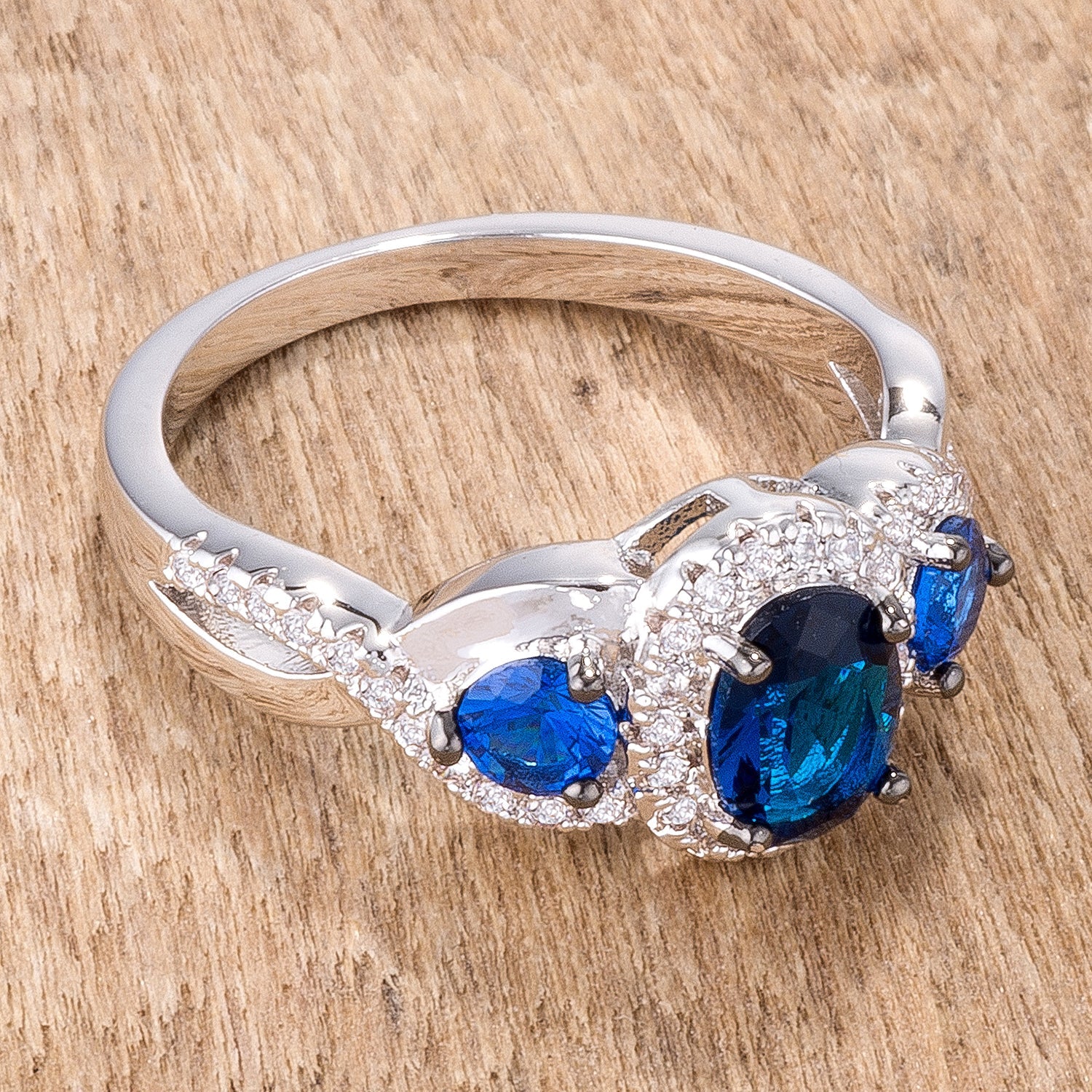 Sculpted Curve Modern Icon 1.43Ct Rhodium & Hematite Plated Sapphire Blue & Clear CZ Three Stone Twisted Ring - Friggin Jewelry Fashion